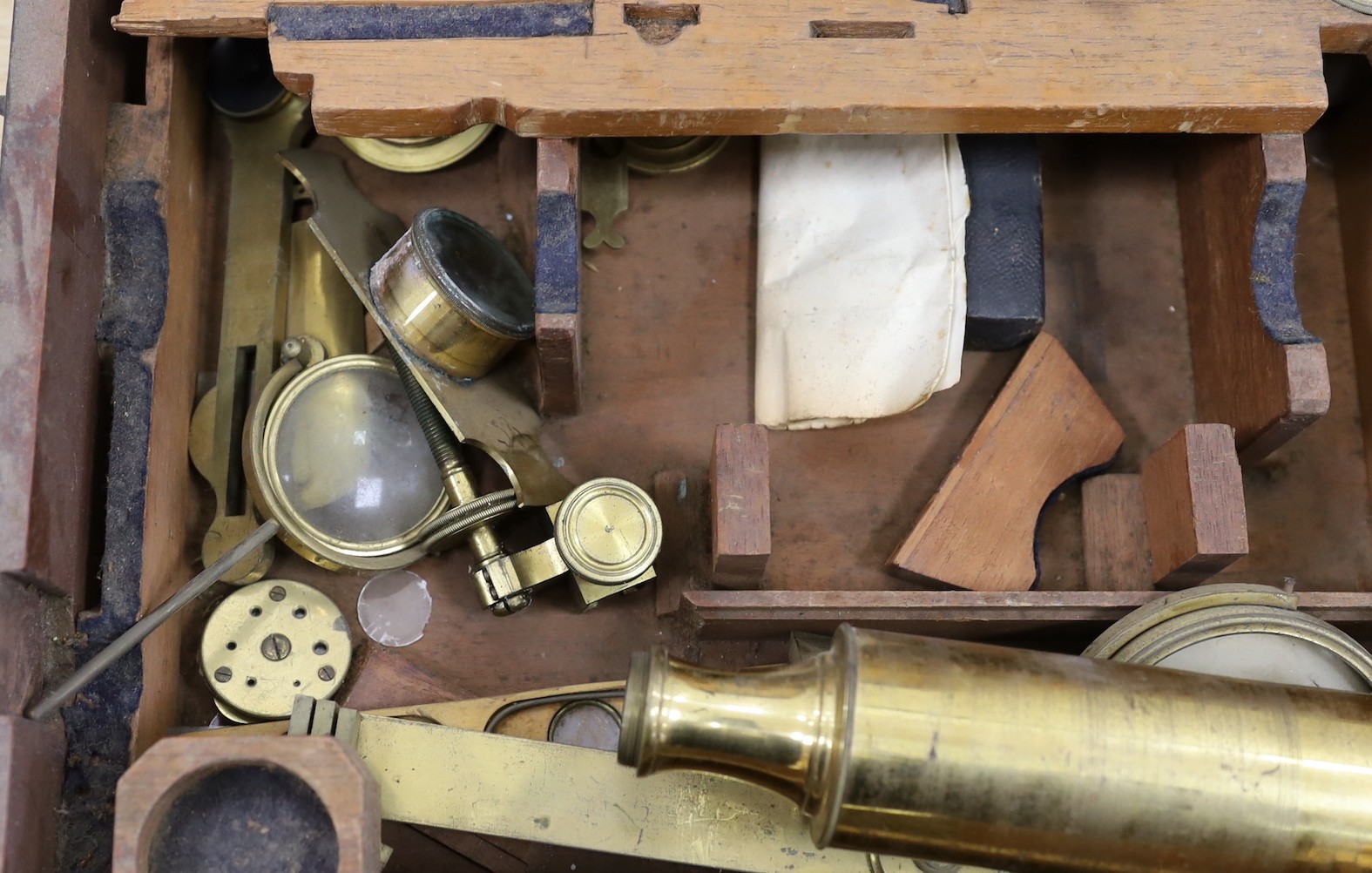 A 19th century cased brass monocular microscope